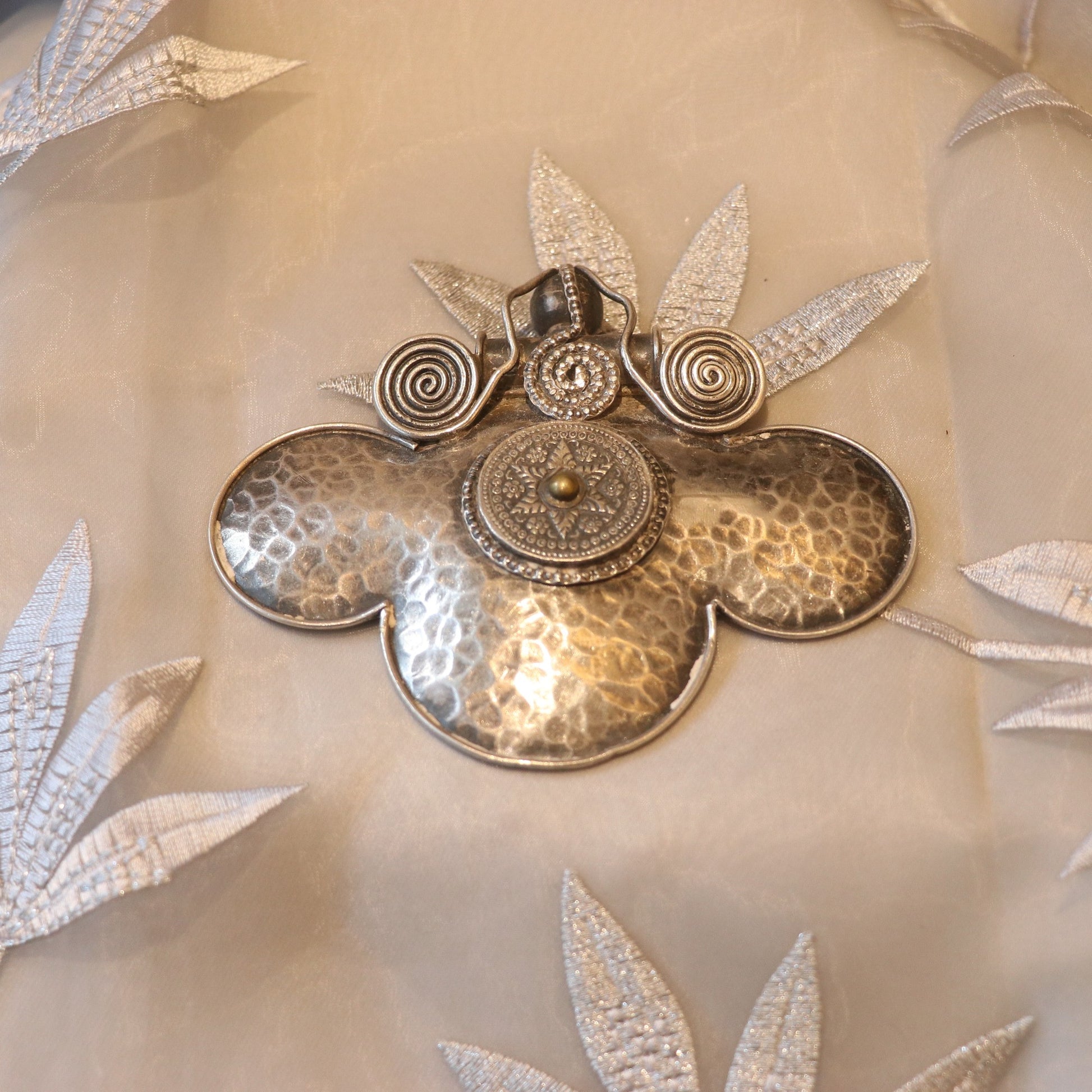 HANDCRAFTED SILVER PENDANT WITH A HAMMERED TEXTURE