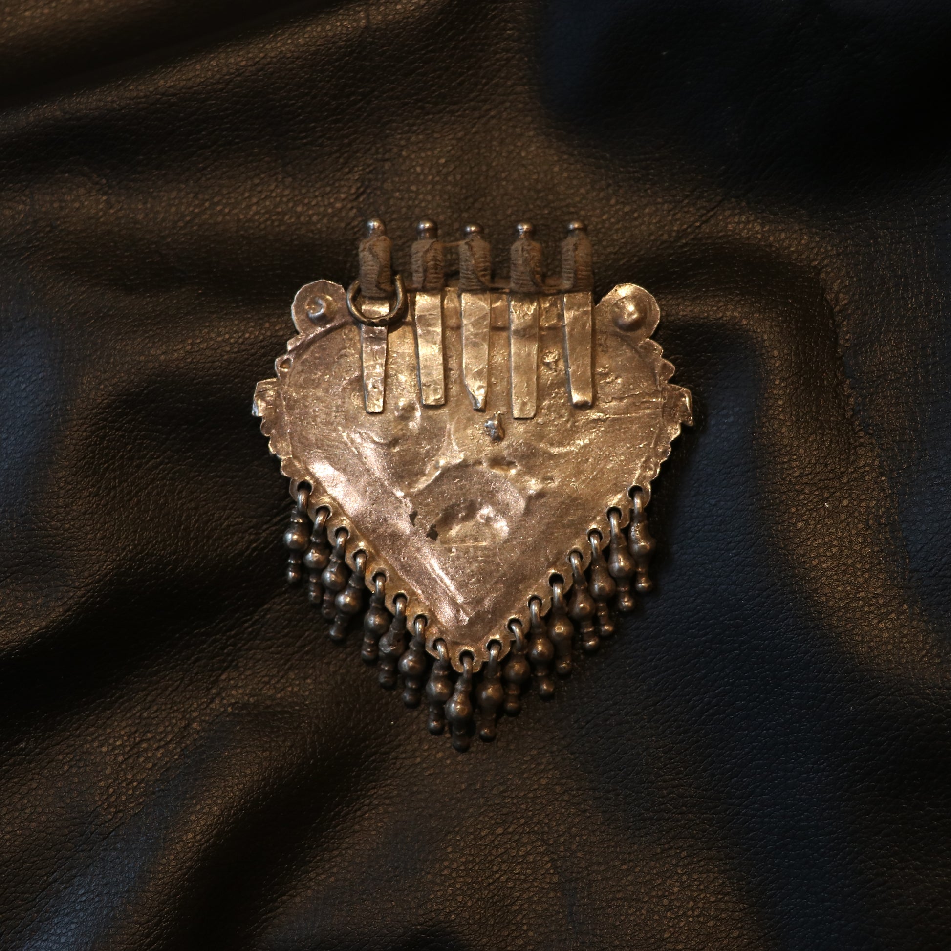 TRADITIONAL TRIANGULAR SILVER PENDANT